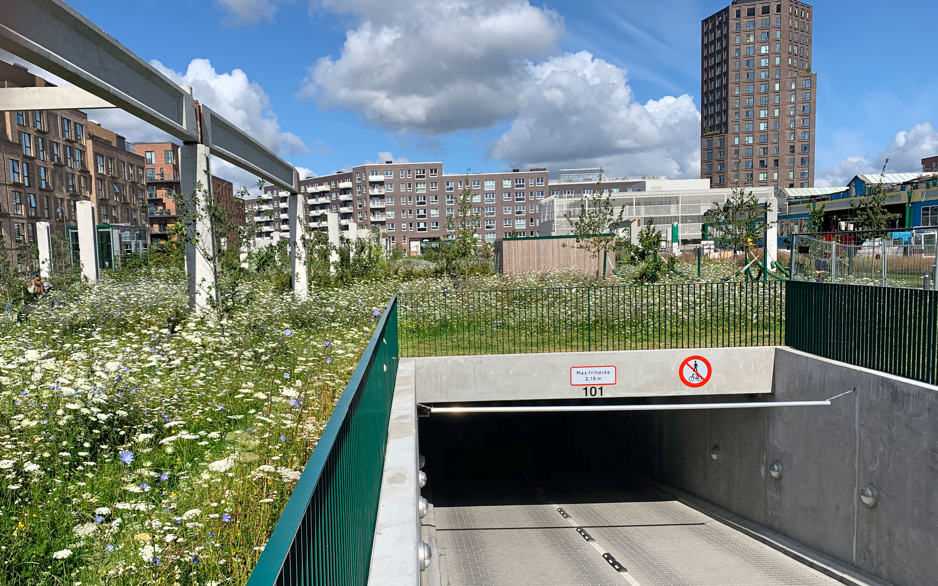 Grønttorvet park is situated on top of a large underground garage.  Entrance into the underground garage